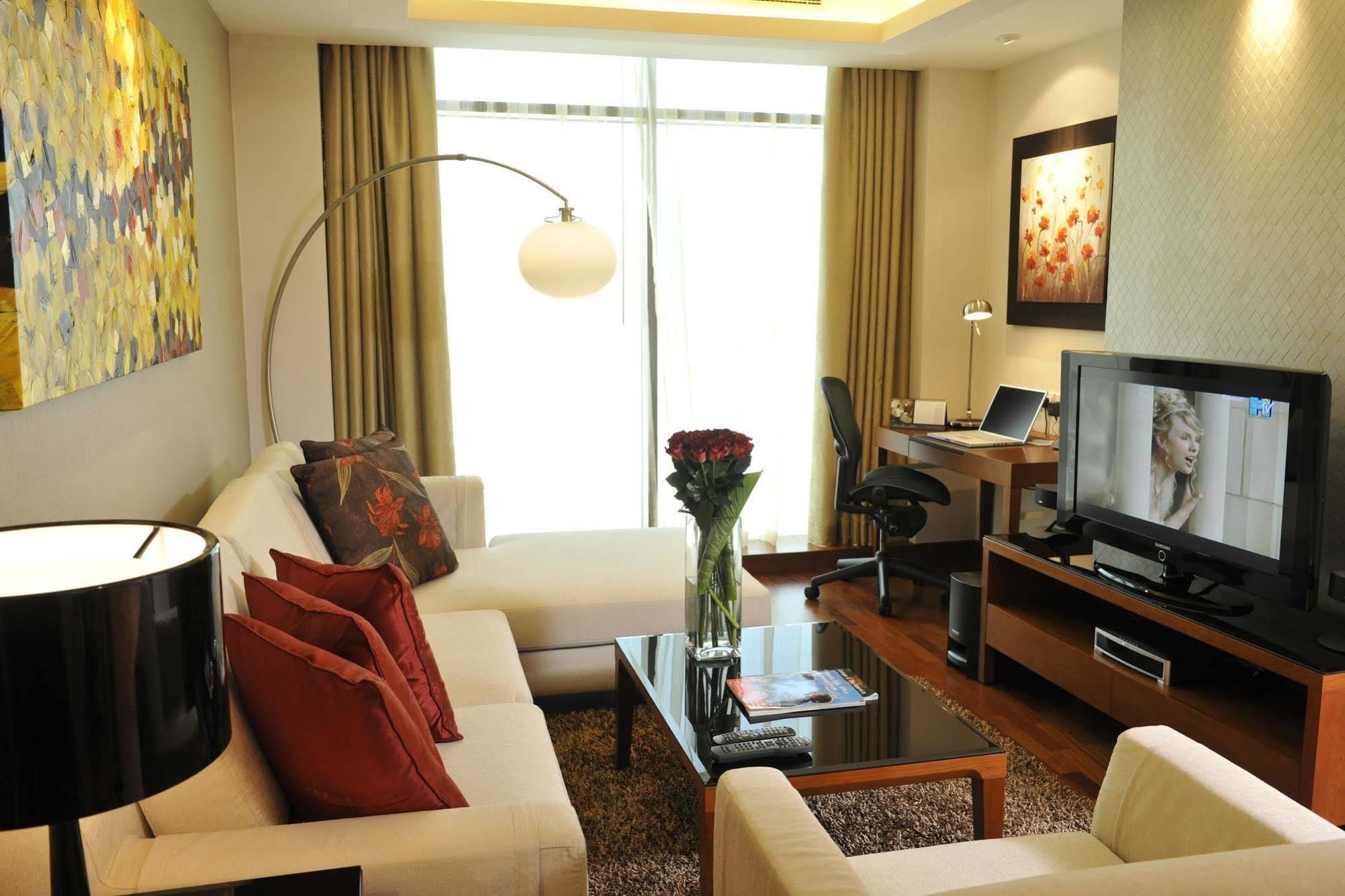 Fraser Suites Seef Bahrain Manama Room photo A living room in a serviced apartment in Kuala Lumpur, Malaysia